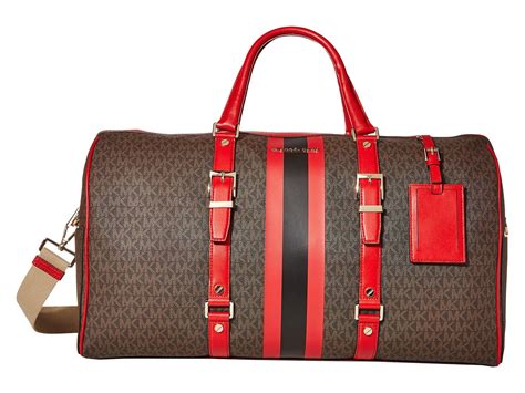 michael kors duffle bag womens|Michael Kors travel suitcase.